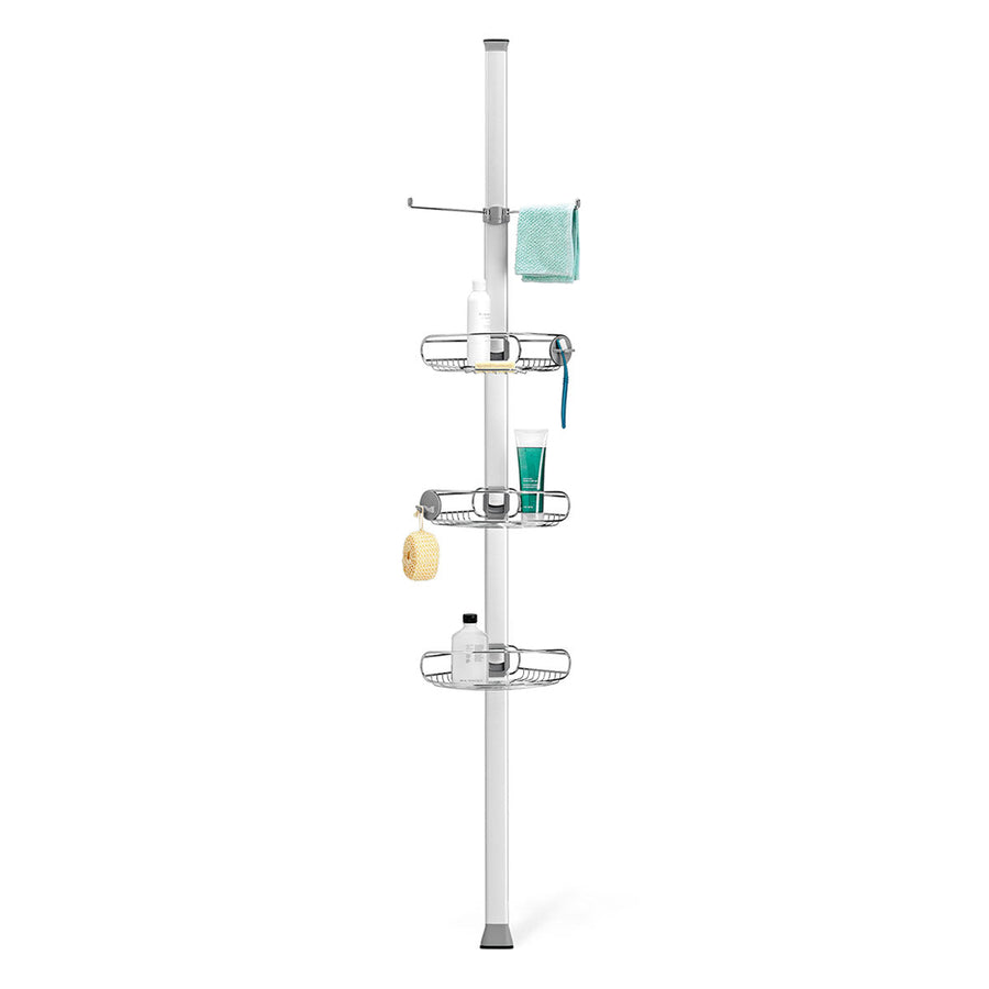 Simplehuman Polished Stainless Steel Tension Shower Caddy. Front view showing 3 adjustable baskets, towel bar, and utility hooks.