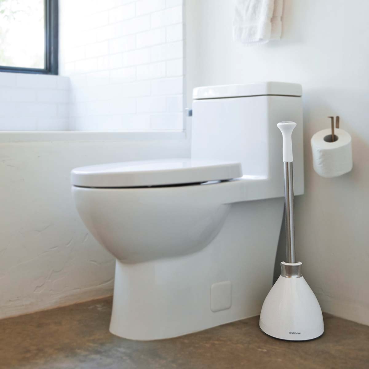 toilet plunger - white plastic - lifestyle in bathroom next to toilet