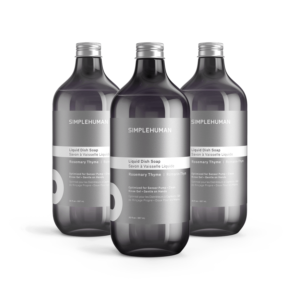 Simplehuman's Rosemary Thyme Liquid Dish Soap in 3 charcoal colored bottles and titanium caps.