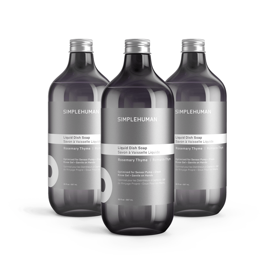 Simplehuman's Rosemary Thyme Liquid Dish Soap in 3 charcoal colored bottles and titanium caps.