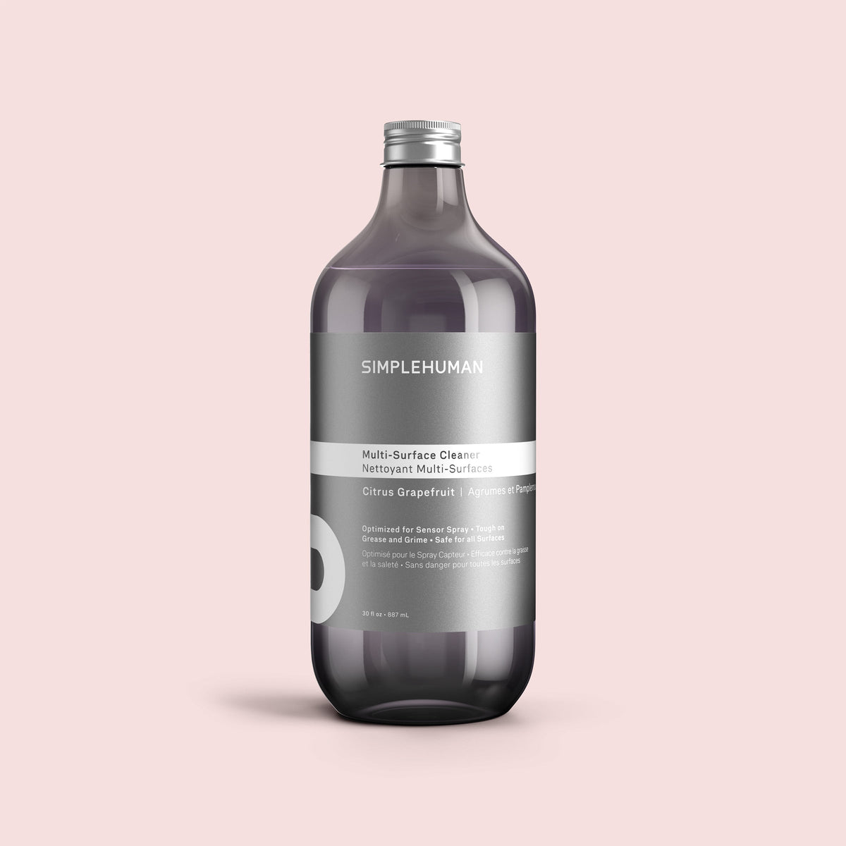Simplehuman's Citrus Grapefruit Multi-Surface Cleaner Refill Bottle on a colored background.