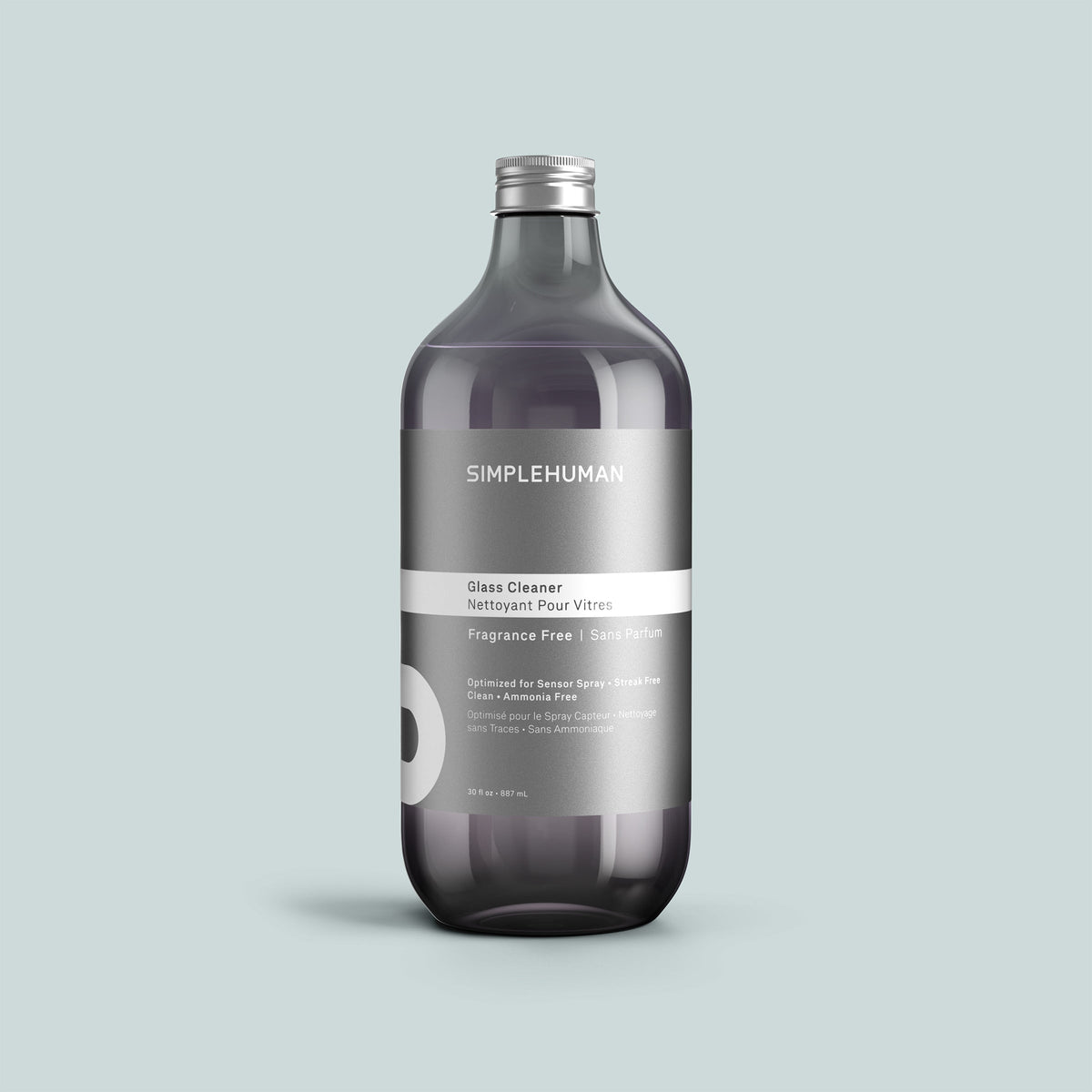Simplehuman's Fragrance Free Glass Cleaner Refill Bottle on a colored background.