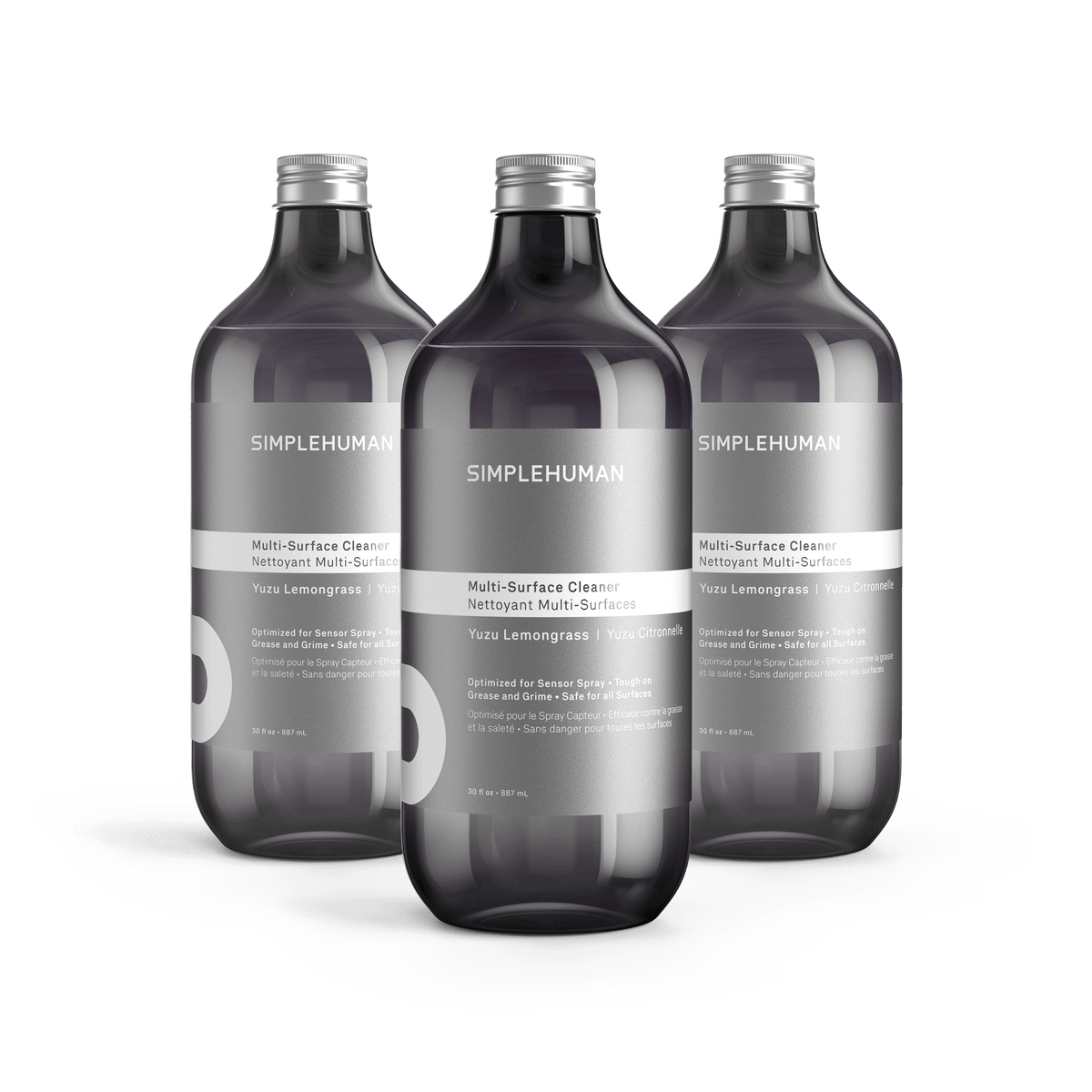 Simplehuman's Yuzu Lemongrass Multi-Surface Cleaner in 3 charcoal colored bottles and titanium caps.