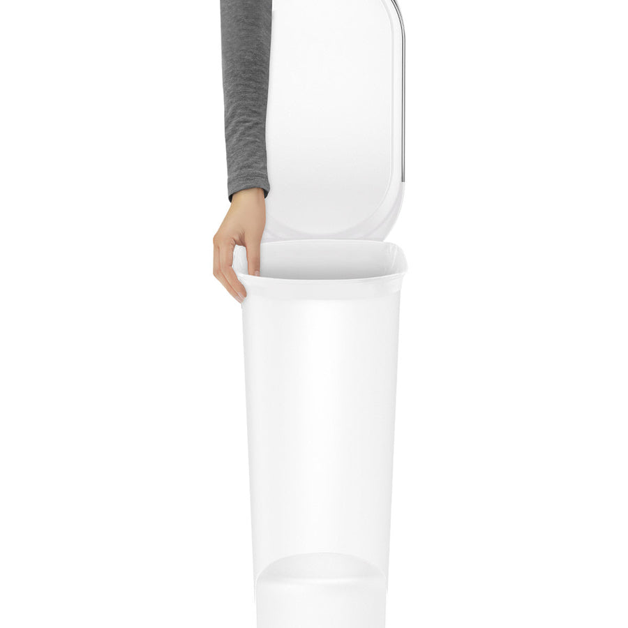 Detail view: Simplehuman 40L Slim Step Can, White Plastic, showing the liner rim securing and concealing the bag.