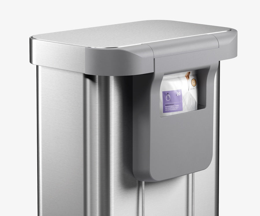 This image showcases the Simplehuman 58L Step Can in Brushed and it's ability to store the Code Q Custom Fit Liners in the back storage pocket.