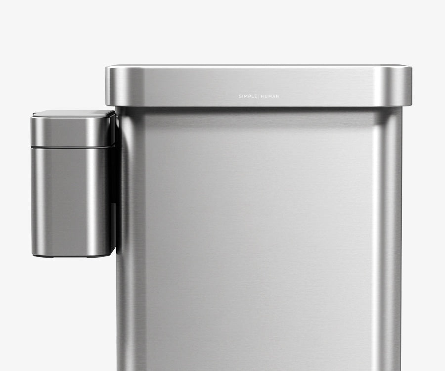 Front view of Simplehuman's Brushed Step Can with an optional Compost Caddy docked to the left side of the can.
