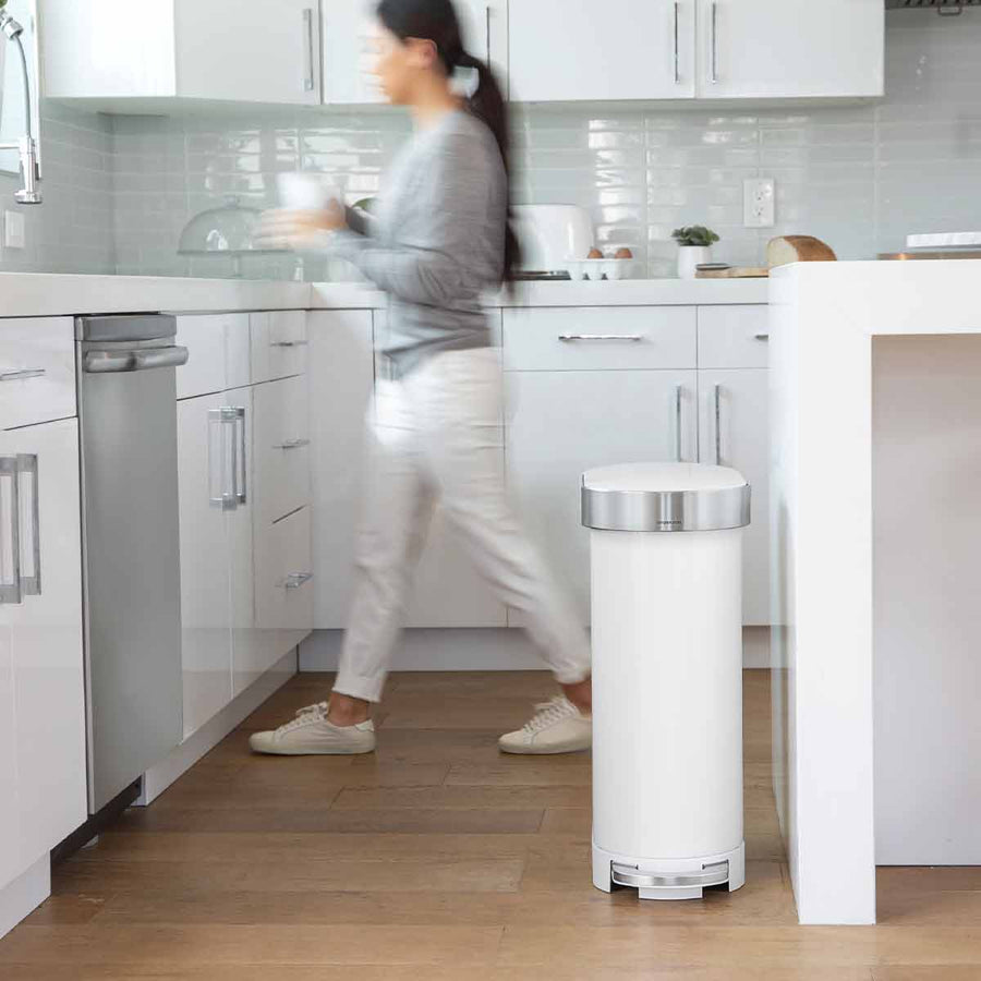 Simplehuman 45L Slim Step Can, White/Brushed Steel, shown in kitchen, space-saving hands-free design.
