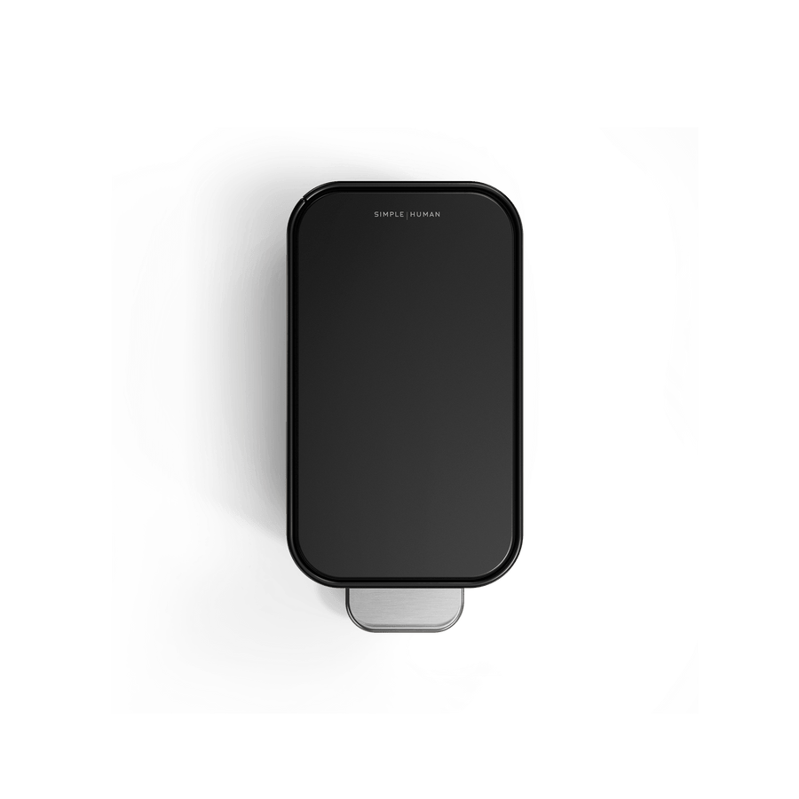 Simplehuman 5L Slim Step Can, Top view, Matte Black, showcasing narrow profile and stainless steel pedal.