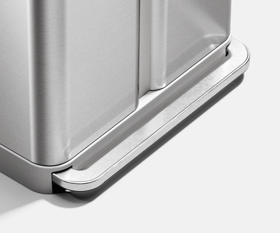 This image features Simplehuman's 58L Step Recycler in Brushed. It is zoomed on the step portion of the can.
