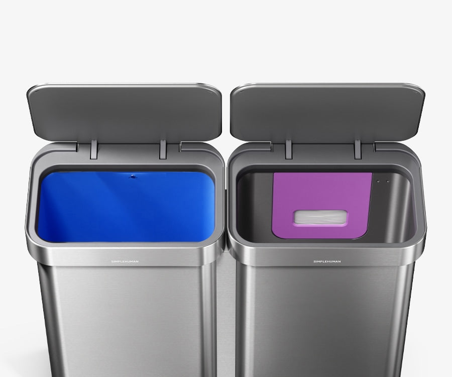 Simplehuman's 90L Step Recycler in Brushed with the lip open showcasing the optional inner blue bucket and easy dispense liner pack storage.
