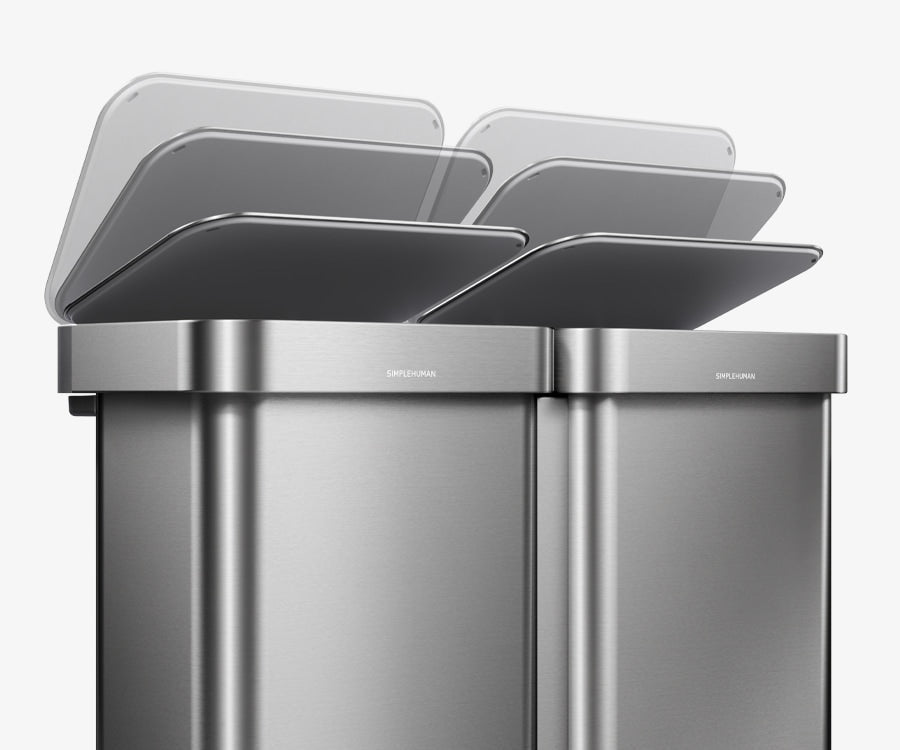 Simplehuman's 90L Step Can in Brushed showcasing how the can has a soft close feature allowing for a seamless and quiet trash experience. The image features the soft and slow closing on the cans at an angle. 