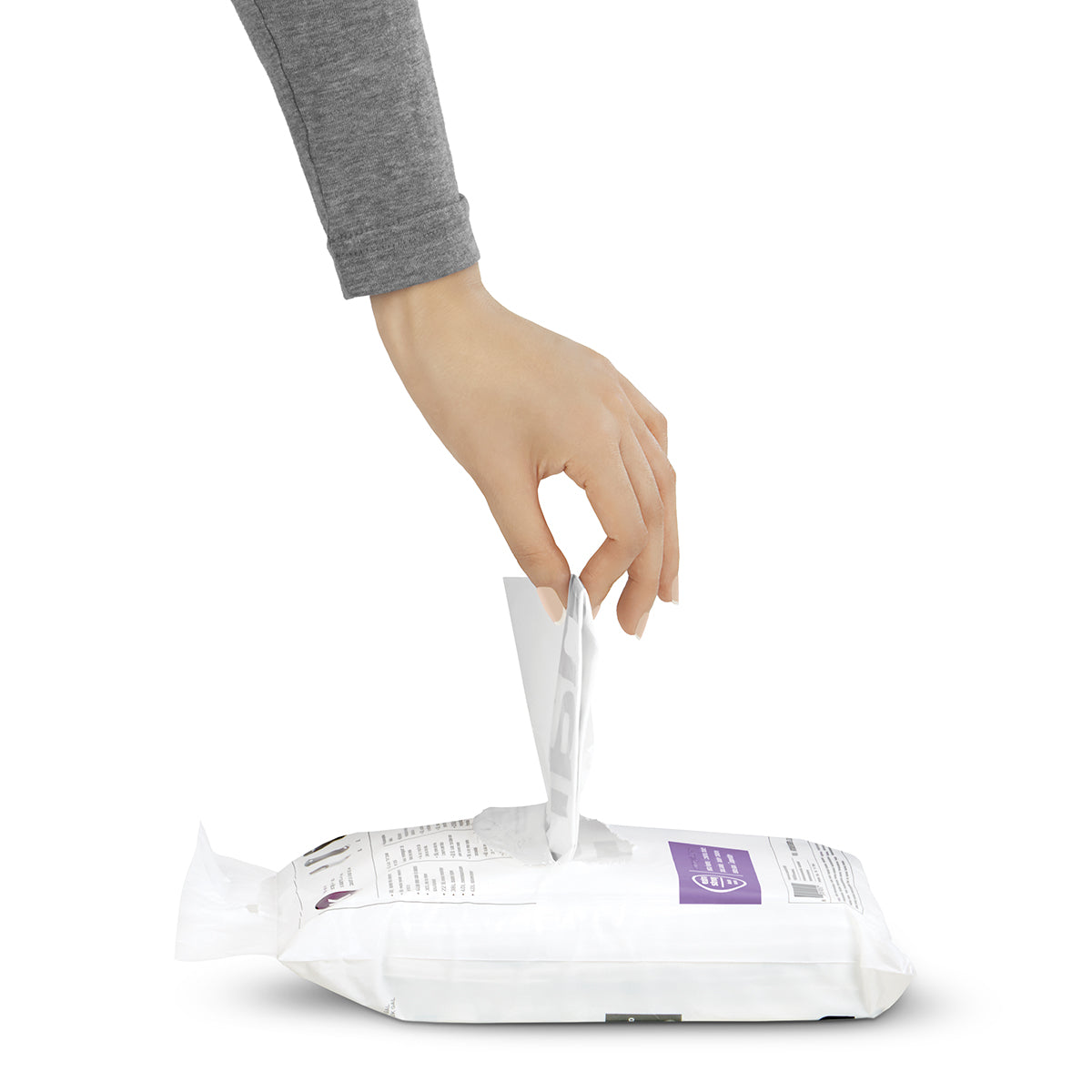 Detail view of Simplehuman Code C Custom Fit white Liners package, showing continuous pull dispensing by hand.
