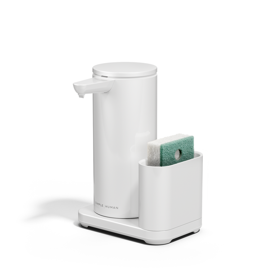 Angled view: Simplehuman White 14 oz Sensor Pump + Caddy, touch-free rechargeable dispenser holding a sponge.