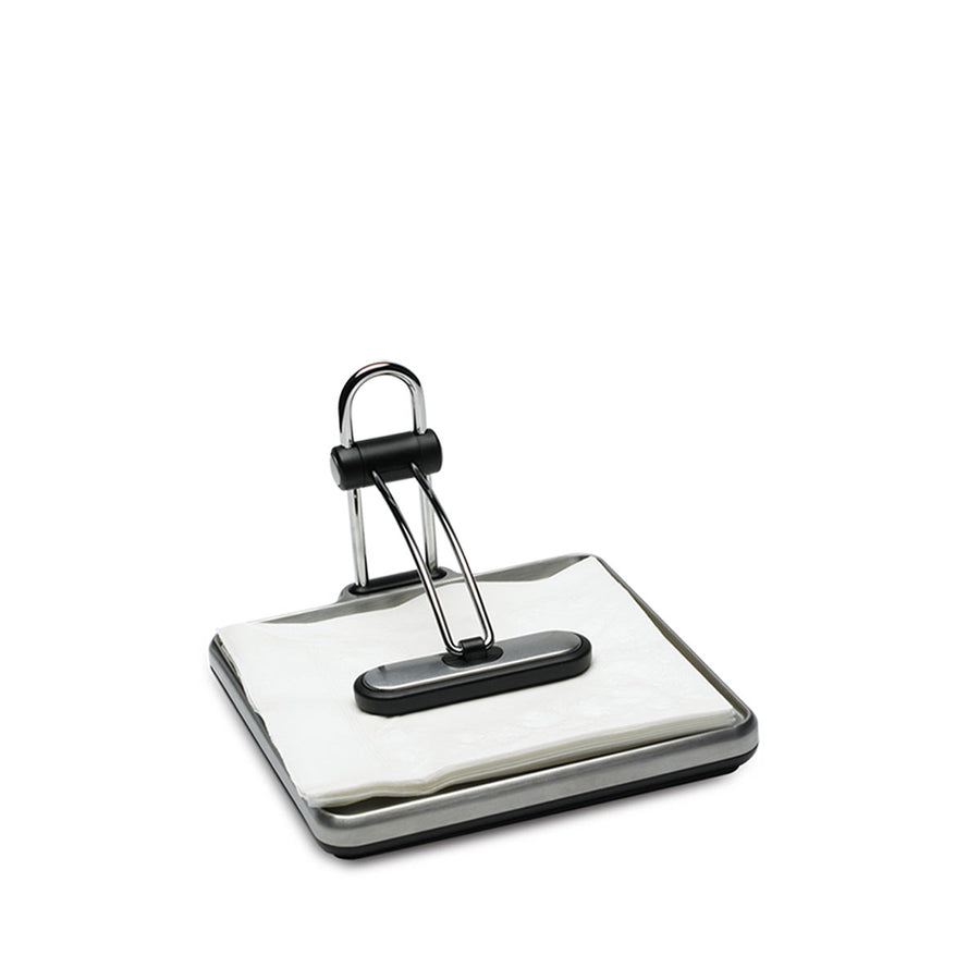 Simplehuman Quick Grip Napkin Holder in Polished Stainless Steel with weighted black arm to secure napkins.