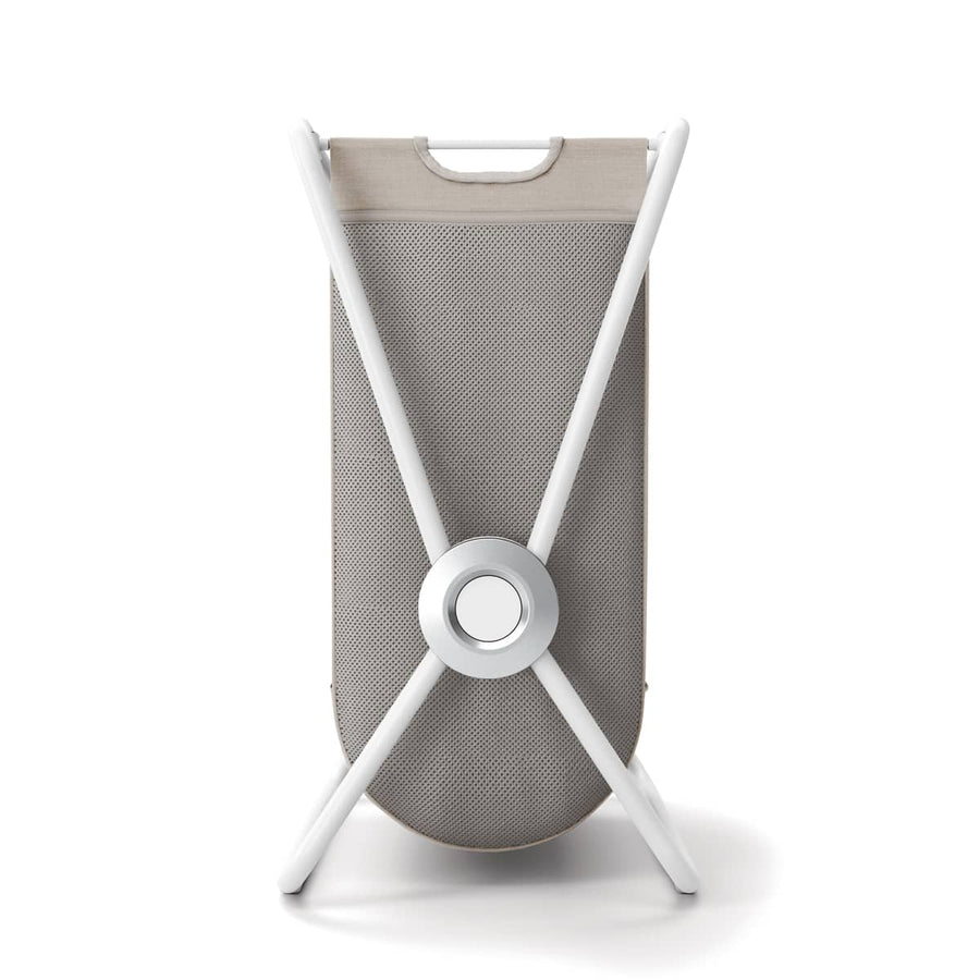 Back view of Simplehuman Double X-Frame Hamper, White frame structure supporting the dual beige/gray removable liner.