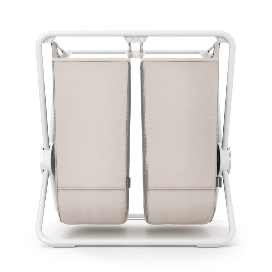Front view of Simplehuman Double X-Frame Hamper, White, dual removable liners for laundry sorting.