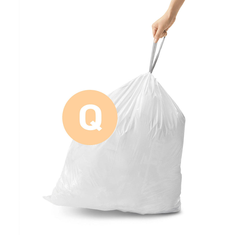 Angled view of Simplehuman White Code Q Custom Fit Liner, full bag lifted by strong gray drawstring closure.