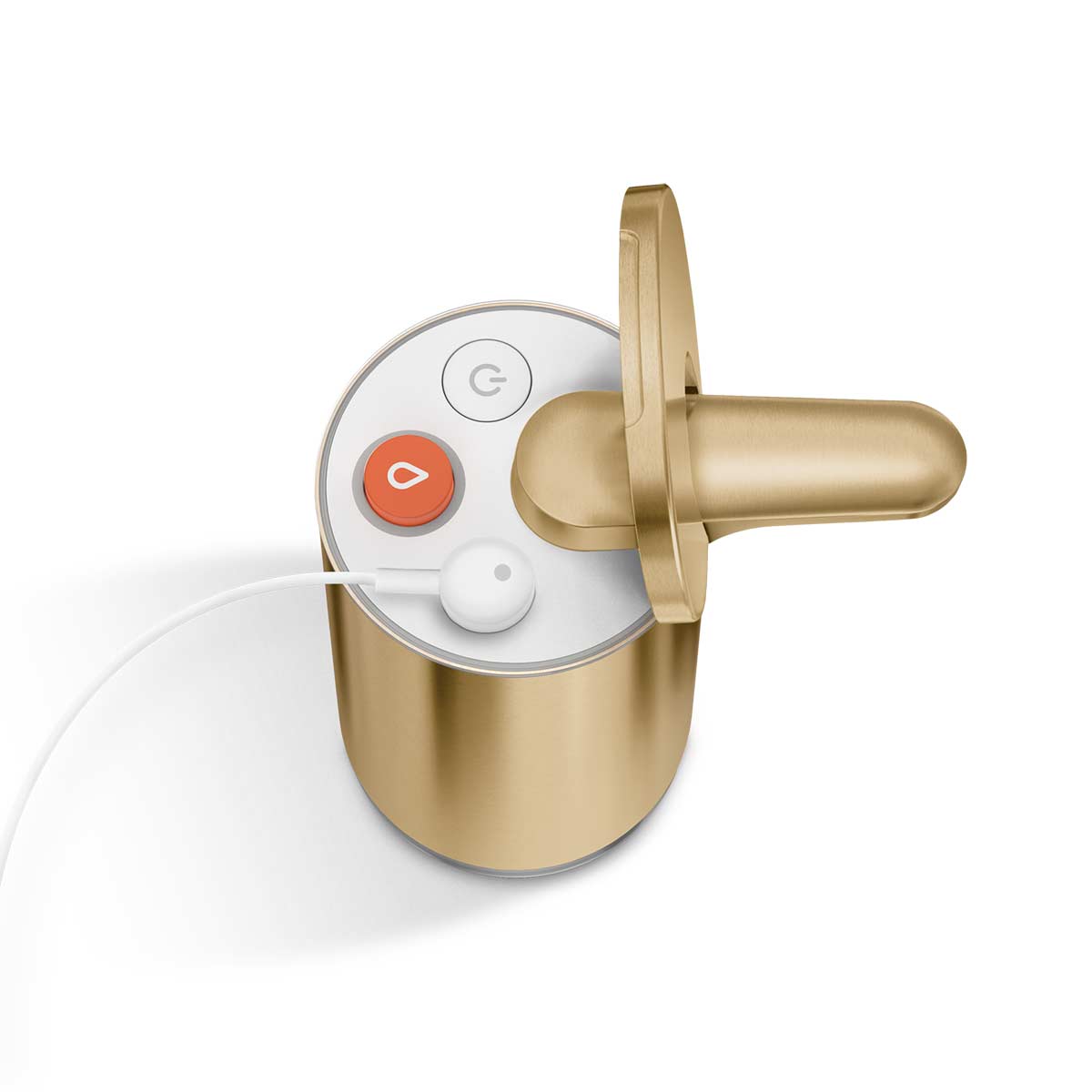 Detail view of Simplehuman Brass Foam Sensor Pump top showing magnetic charging cable attached, power and dose controls.