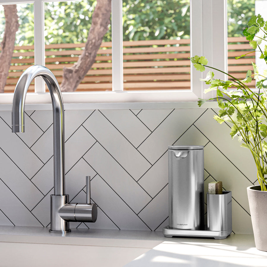 Simplehuman Brushed Stainless Steel Sensor Pump 14 oz. with Caddy in bright kitchen setting. Hands-free soap.