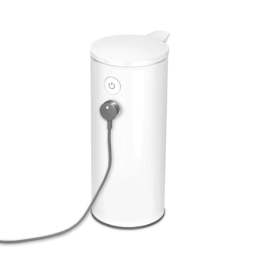 Simplehuman White 9 oz. Rechargeable Sensor Pump charging via magnetic cable.
