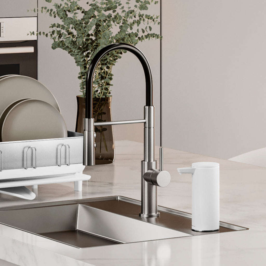 Simplehuman 9 oz. Sensor Pump, White, on modern kitchen counter near sink and dish rack.
