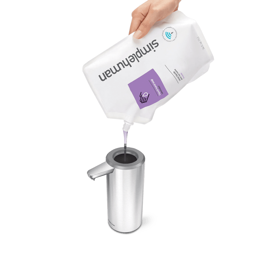 Detail view of Simplehuman 9 oz. Sensor Pump refill process, Brushed Stainless Steel, easy top-loading.