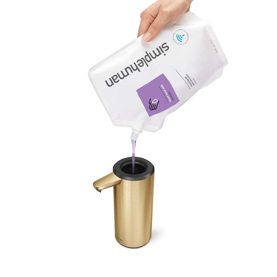 Detail view of Simplehuman 9 oz. Rechargeable Sensor Pump in Brass, easy top-loading refill.