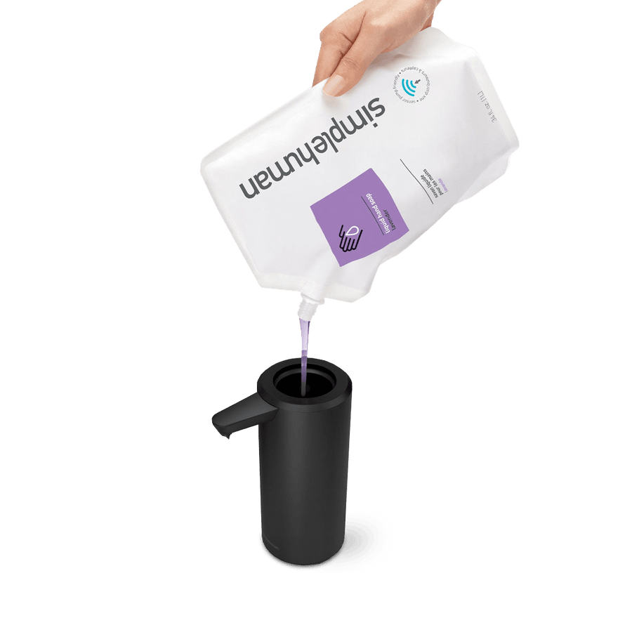 Detail view of Simplehuman 9 oz. Sensor Pump in Matte Black, demonstrating easy top-loading refill with soap pouch.