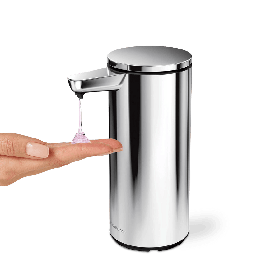 Simplehuman 9 oz. Sensor Pump, Polished Stainless Steel, action view dispensing soap onto hand, touch-free.
