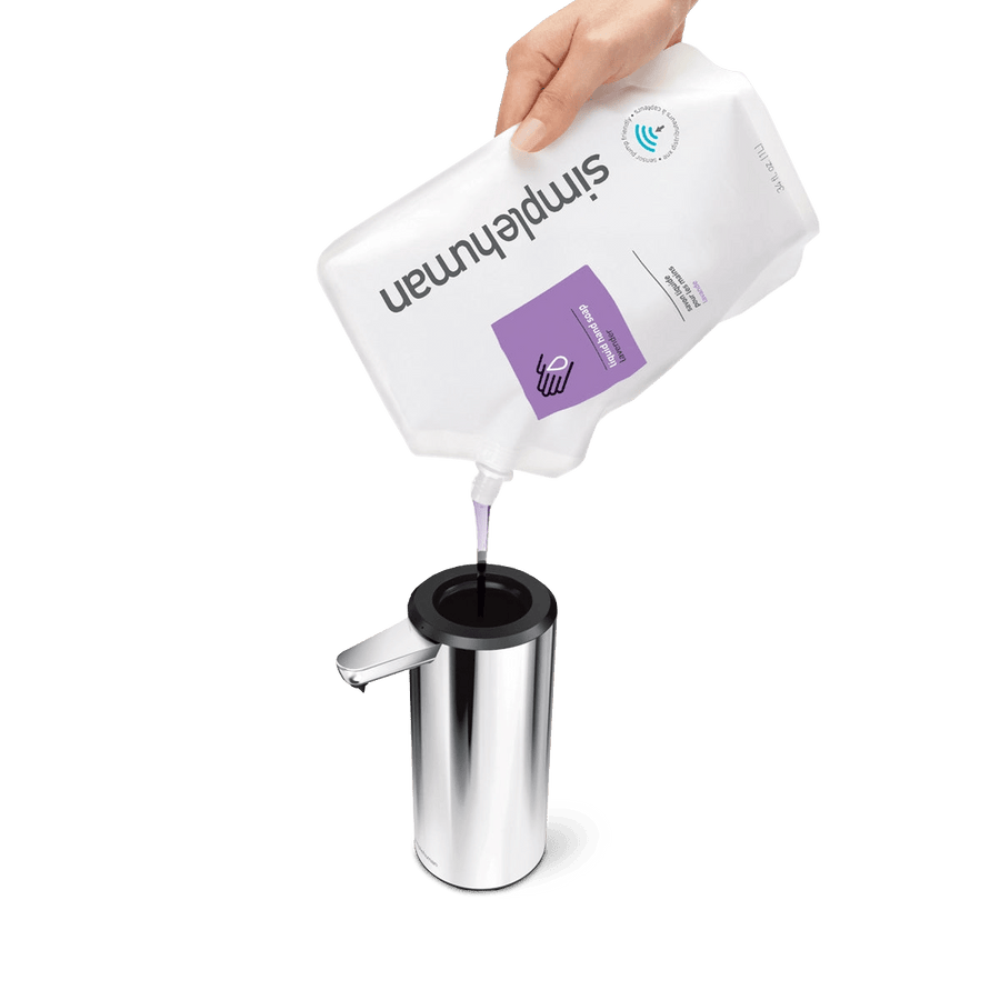 Detail view of Simplehuman 9 oz. Sensor Pump, Polished Stainless Steel, showing easy top-loading refill from soap pouch.