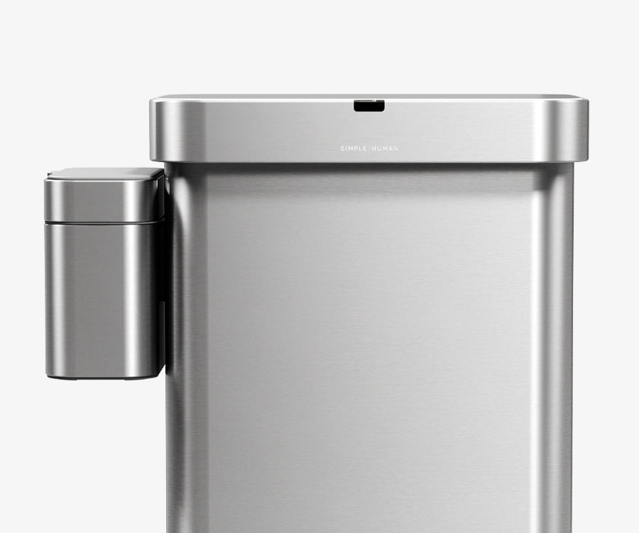 Front view of Simplehuman's Brushed Sensor Can with an optional Compost Caddy docked to the left side of the can.