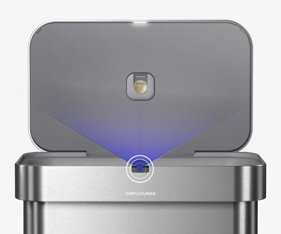 Simplehuman's 58L Sensor Can in Brushed showcasing the sensor technology that is built into the can along with an odorsorb pod tucked away in the lid.