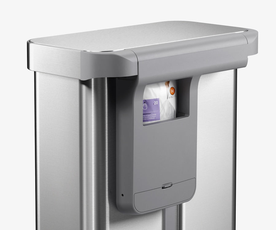 Simplehuman's  Brushed Sensor Recycler features a black compartment that perfectly contains their code H liner pack for quick and easy storage.