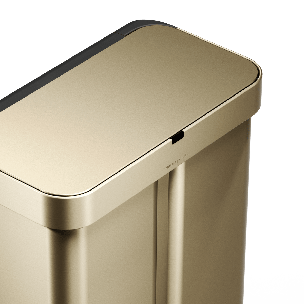 Simplehuman's Matte Gold Sensor Recycler top view highlighting the lid and the sensor.