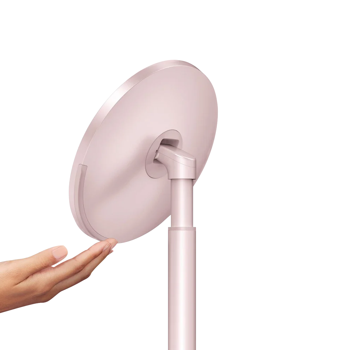 Side profile view, Simplehuman Rose Gold Sensor Mirror Round showing hand gesture activation for automatic light.