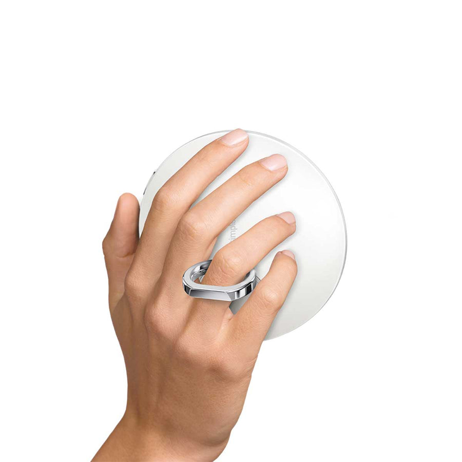 Simplehuman Sensor Mirror Compact 3x in White, held securely closed using the integrated finger ring.