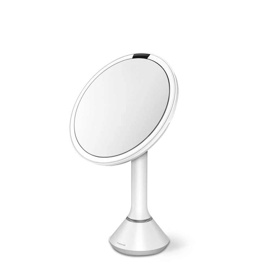 Simplehuman White Sensor Mirror Round. Angled side view showing adjustable tilt and dual light system.