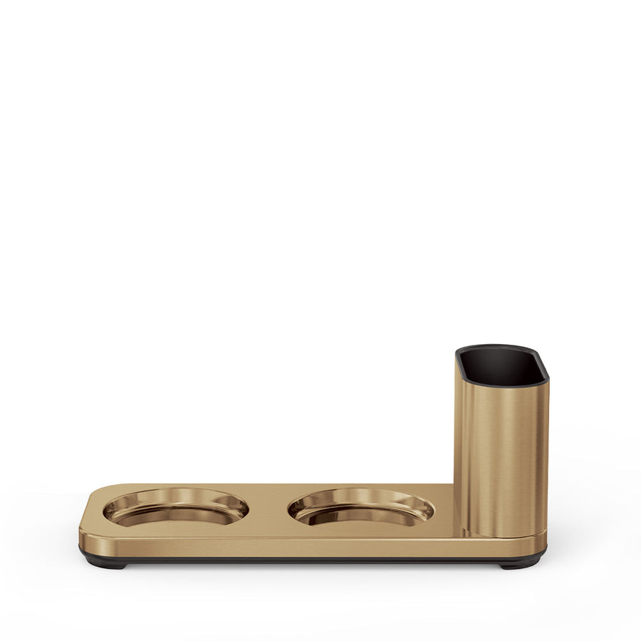 Angled view of Simplehuman Brass Dual Caddy base for two sensor pumps, offering space-saving organization.