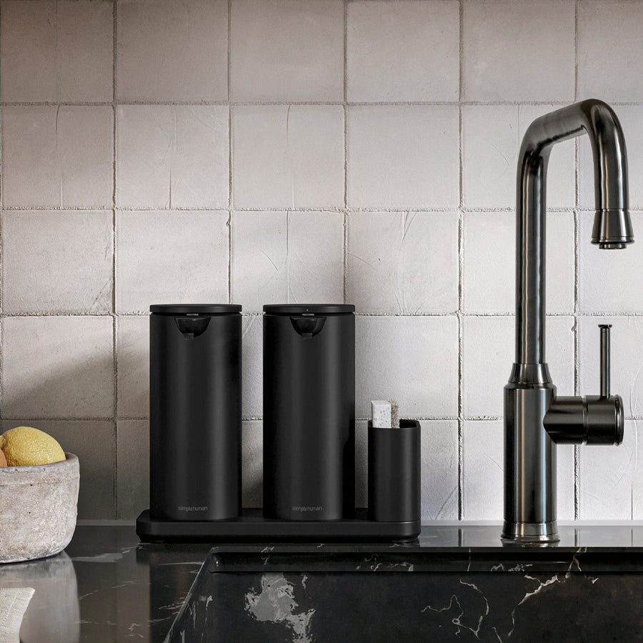 Simplehuman Dual Caddy and two 14 oz sensor pumps in Matte Black, touch-free operation by kitchen sink.