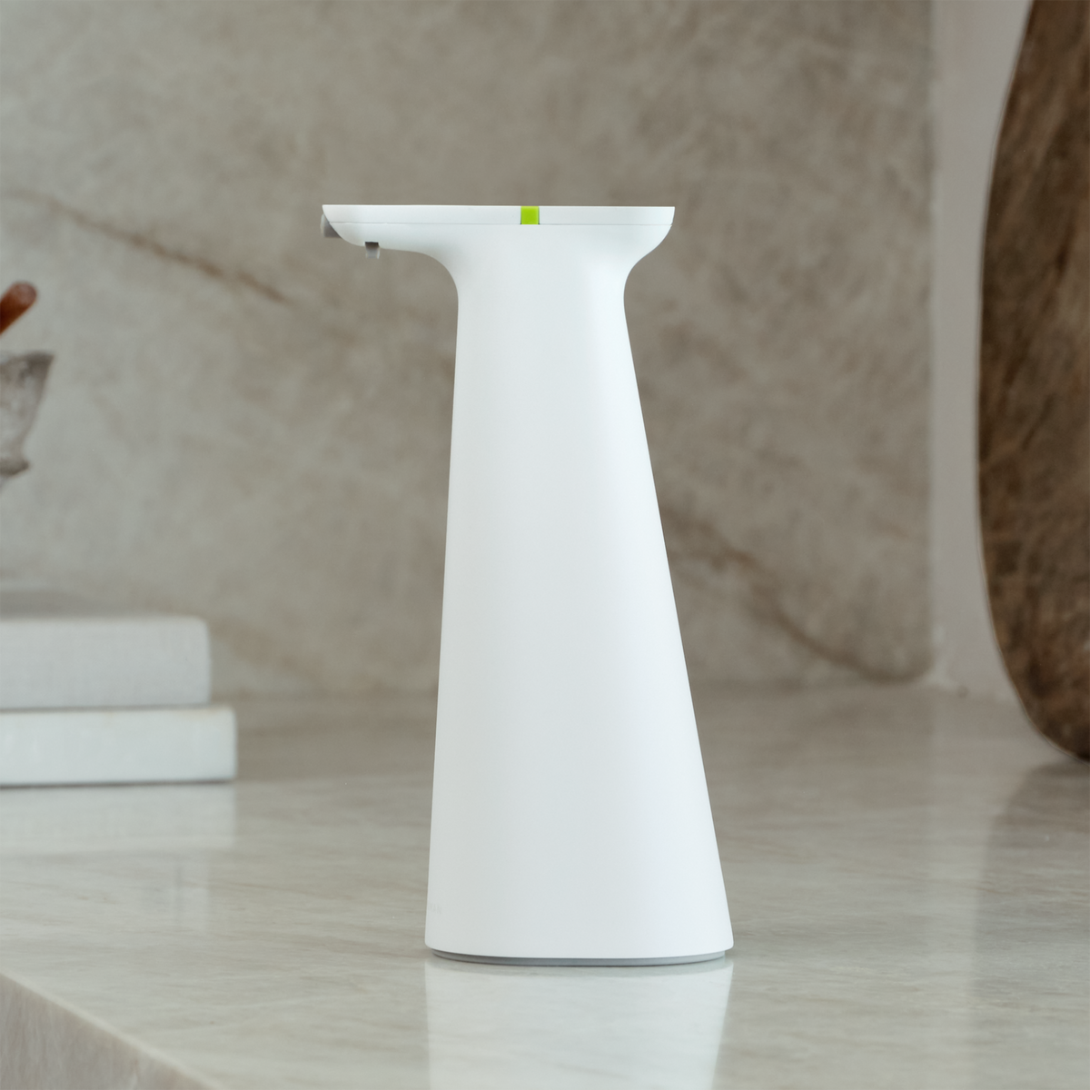 Simplehuman White Sensor Spray on modern marble countertop, touch-free automatic disinfectant dispenser