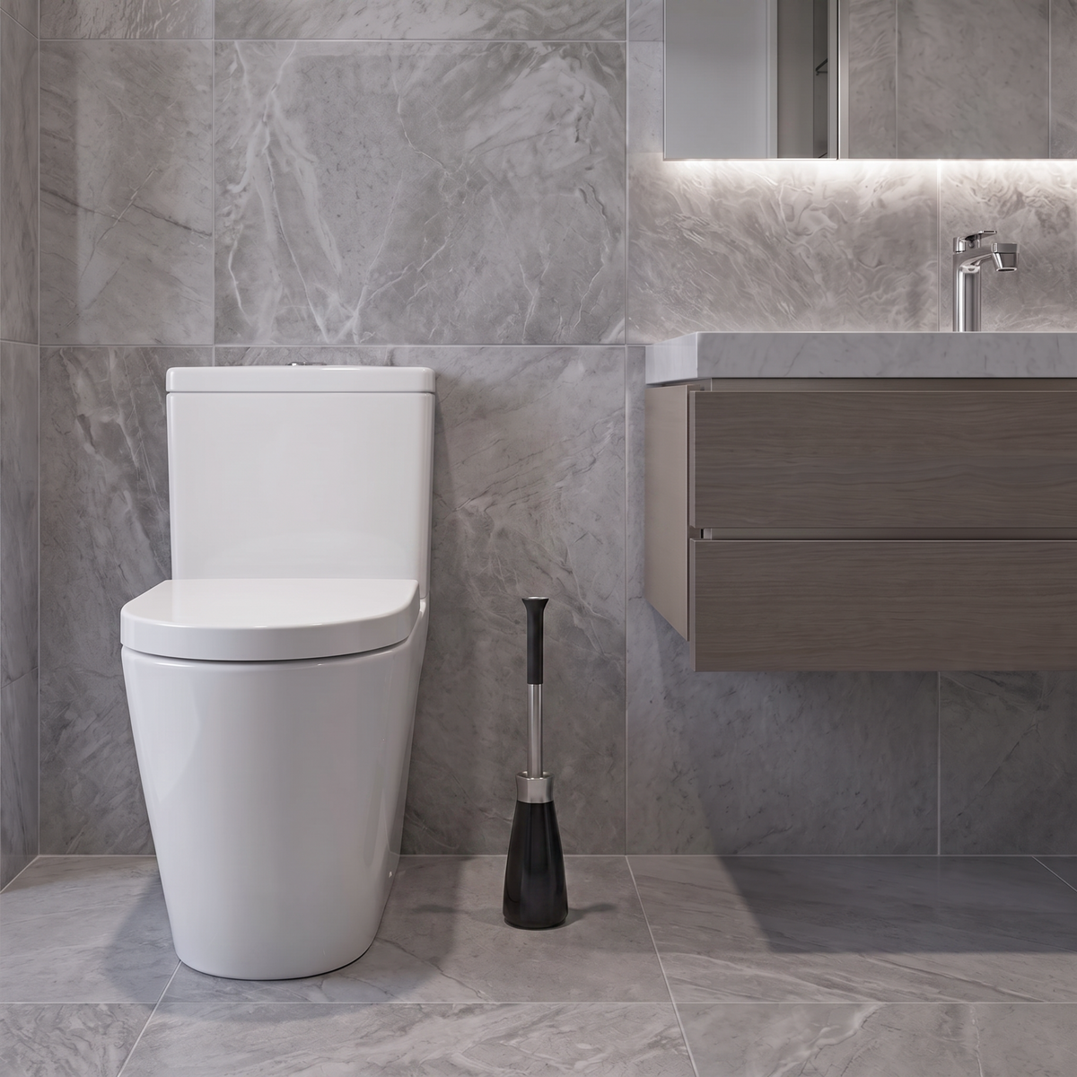 A Simplehuman Black Finished Toilet Brush Placed Beside A Toilet. 