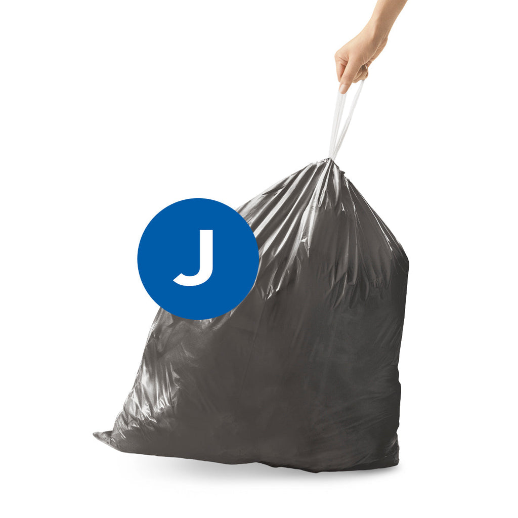 Simplehuman Code J Odorsorb Liner, hand pulling white drawstring closure for easy removal.
