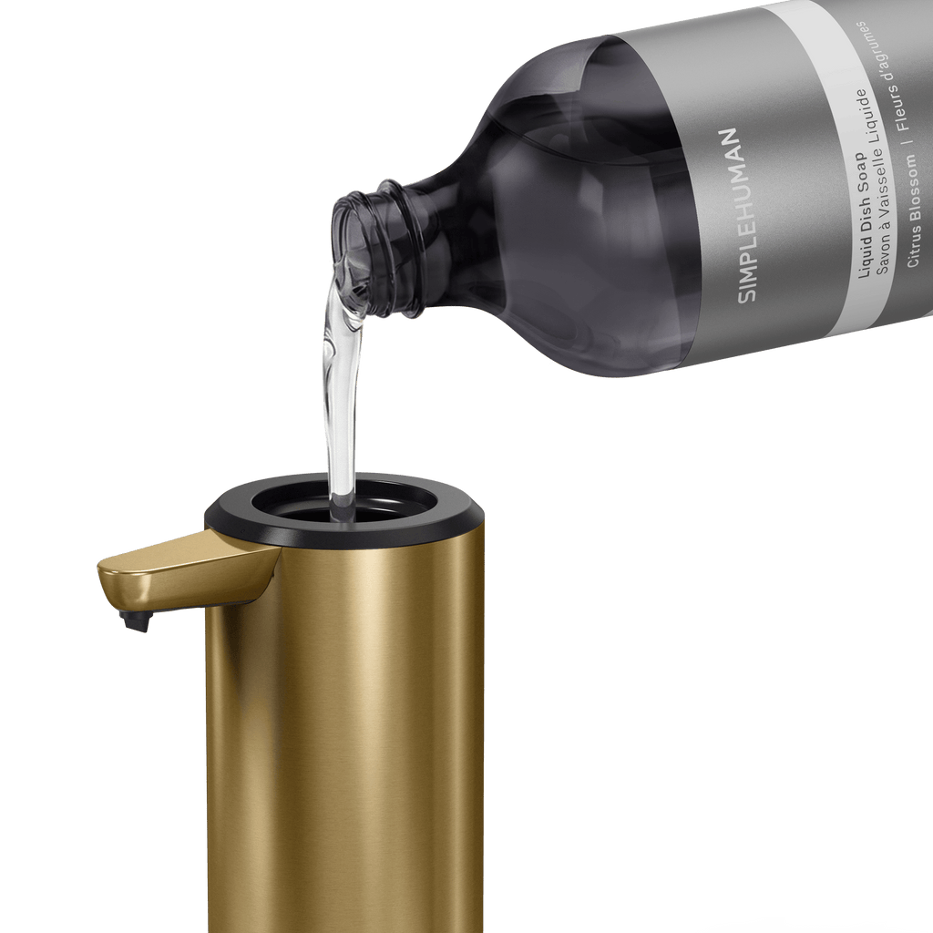 Simplehuman's Refill Bottle filling a Simplehuman Liquid Sensor Pump.  