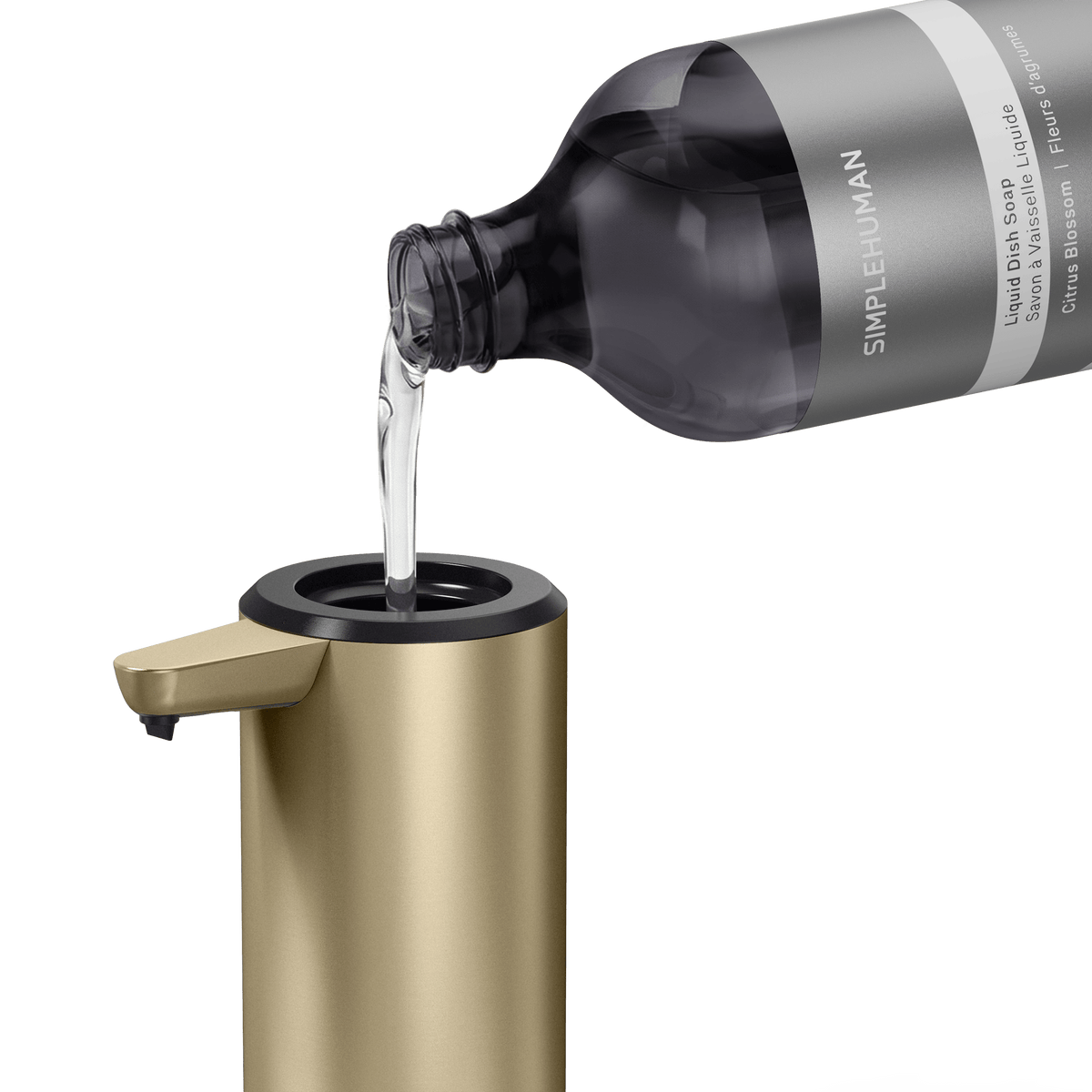 Simplehuman's Refill Bottle filling a Simplehuman Liquid Sensor Pump.  