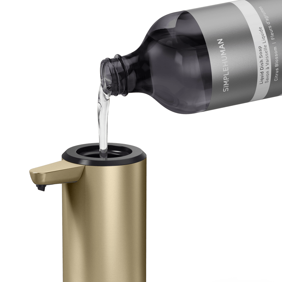 Simplehuman's Refill Bottle filling a Simplehuman Liquid Sensor Pump.  