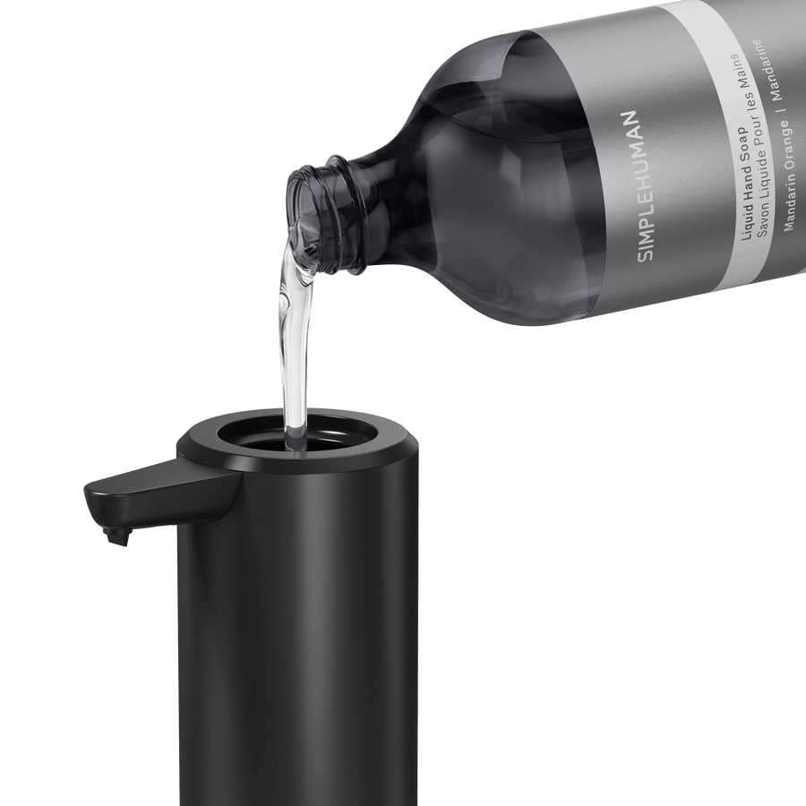 Simplehuman's Refill Bottle filling a Simplehuman Liquid Sensor Pump.  