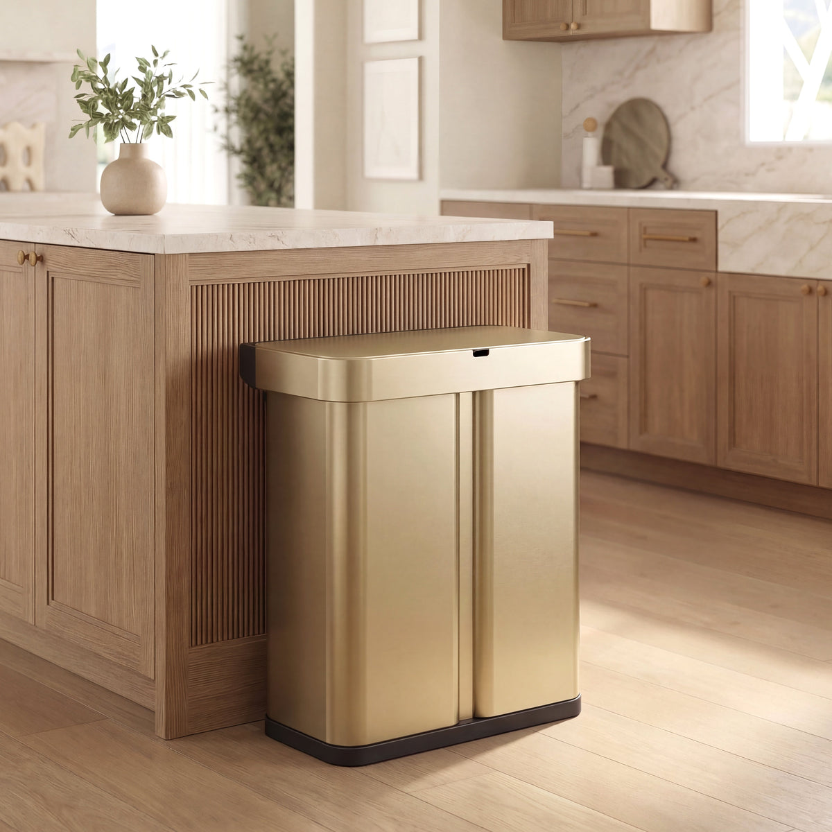 Simplehuman's 58L Sensor Recycler in Matte Gold in a modern, neutral colored kitchen.