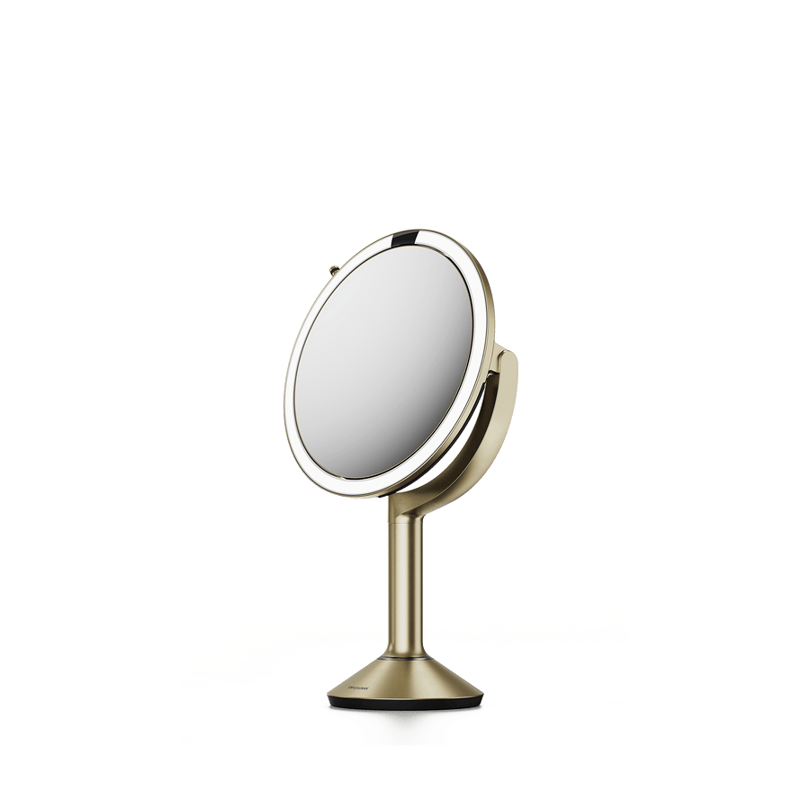 Simplehuman's Sensor Mirror Trio in Matte Gold, side view. 