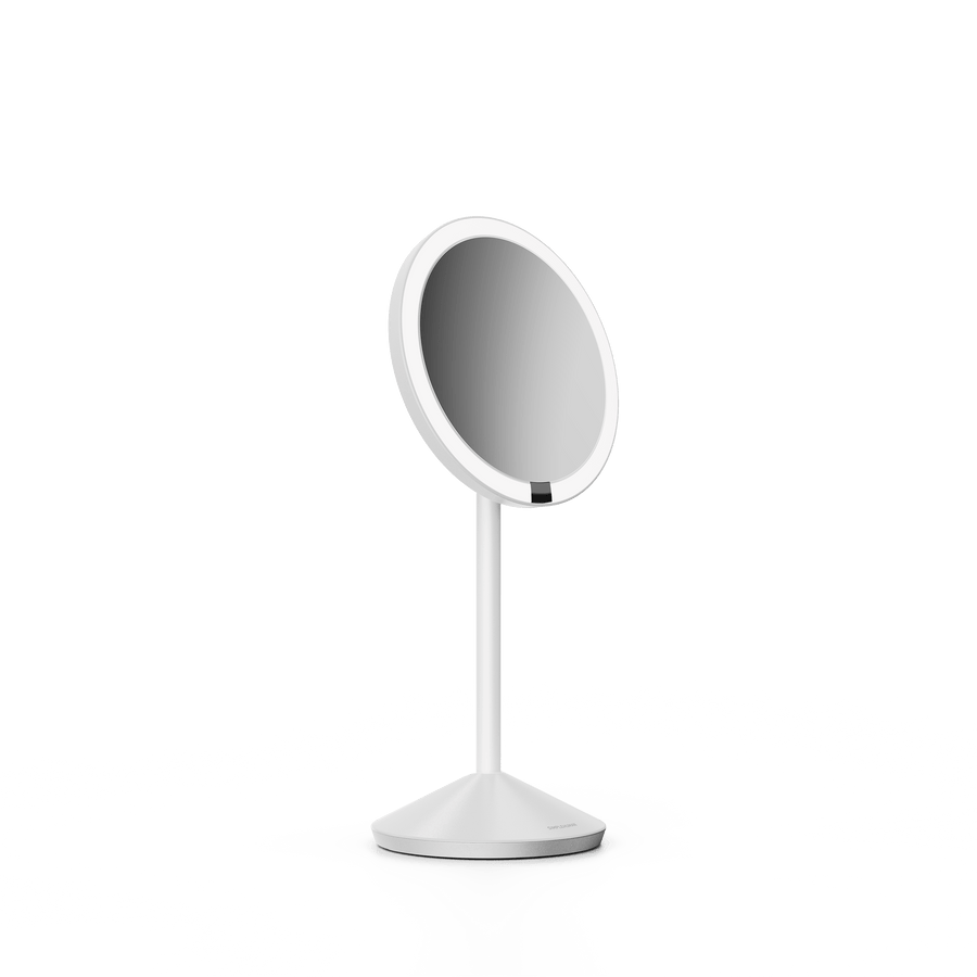 Simplehuman's Sensor Mirror Fold in White, angled view.